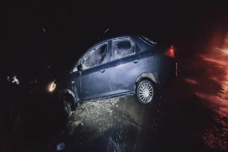 Car in trench